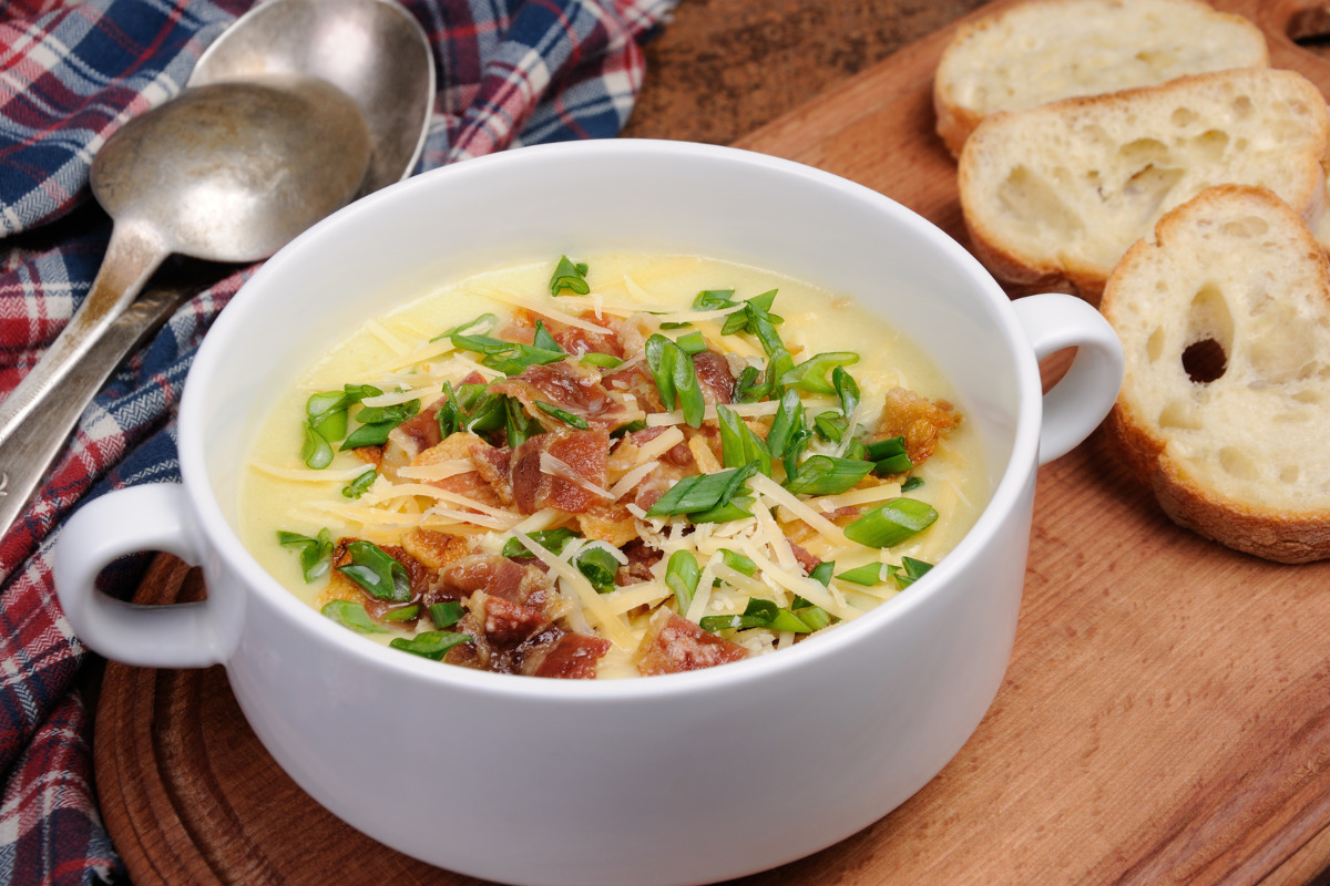 Cheese soup with bacon and bread.