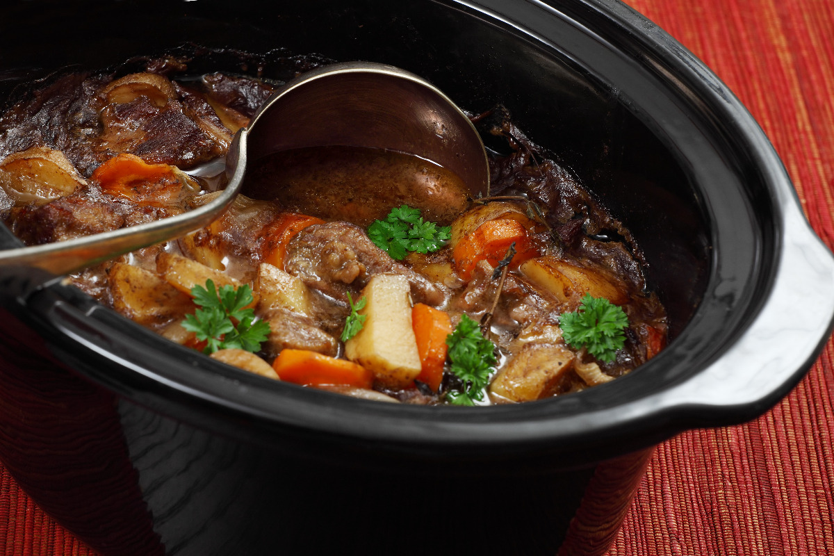 A delicious stew being cooked in a slow cooker. 